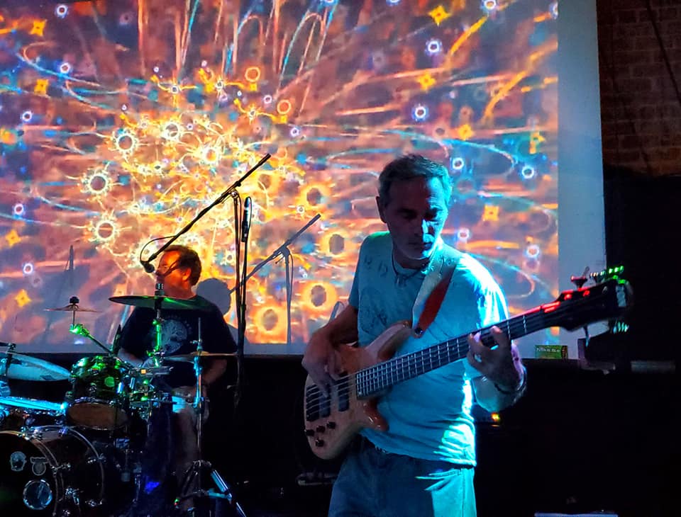 Mark Ryan on bass, Andy Briefer on Drums