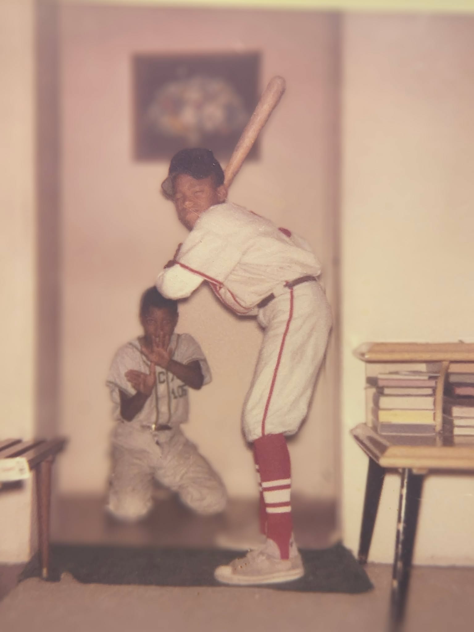 Tucson Musician Spotlight: Amochip Dabney 3 Amochip Dabney and his brother Mike posing in their Newark apartment in Little League uniforms